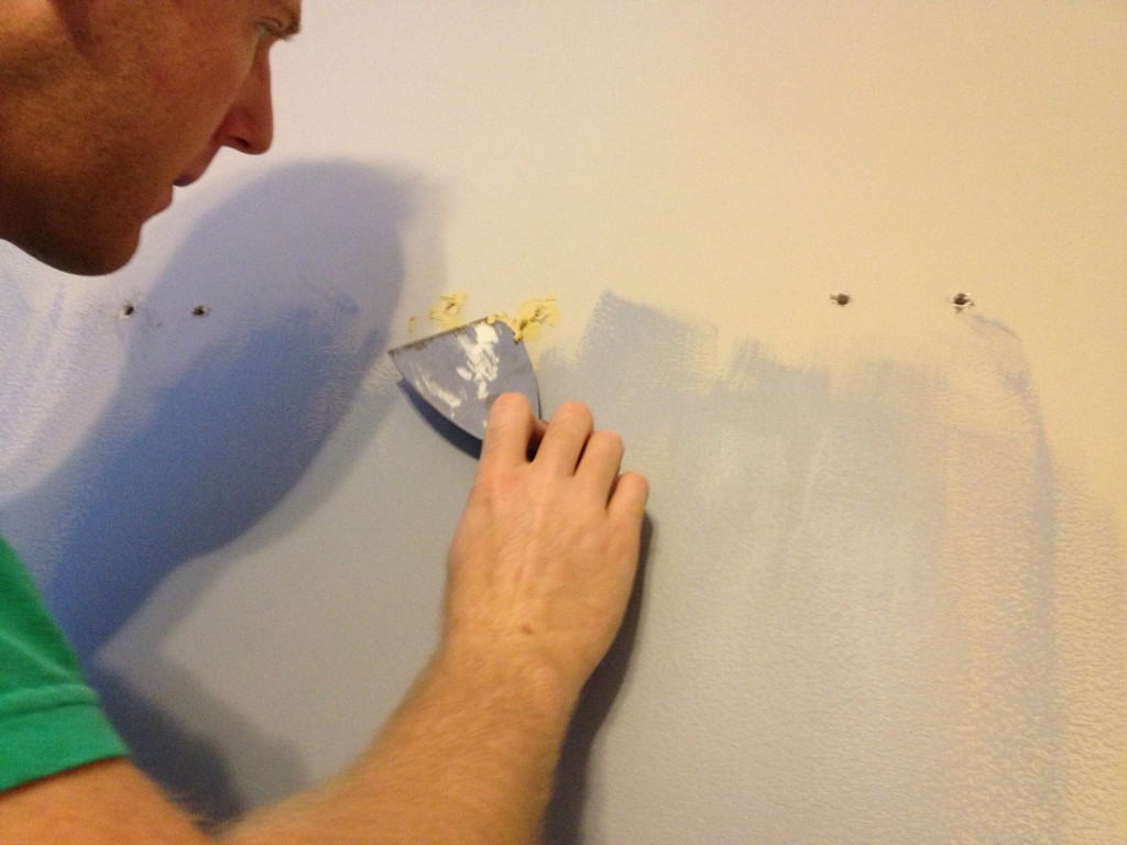 putty to patch holes in wall