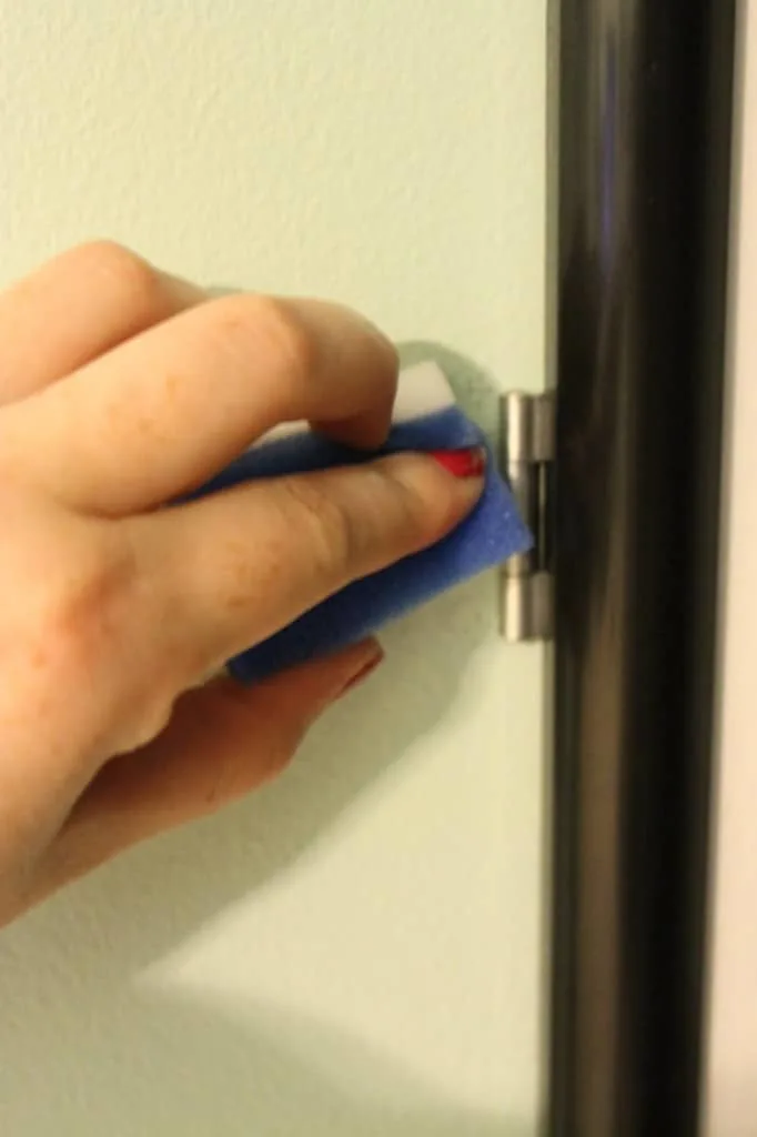Hang a Frame on Hinges to Conceal an Electric Box - Charleston Crafted