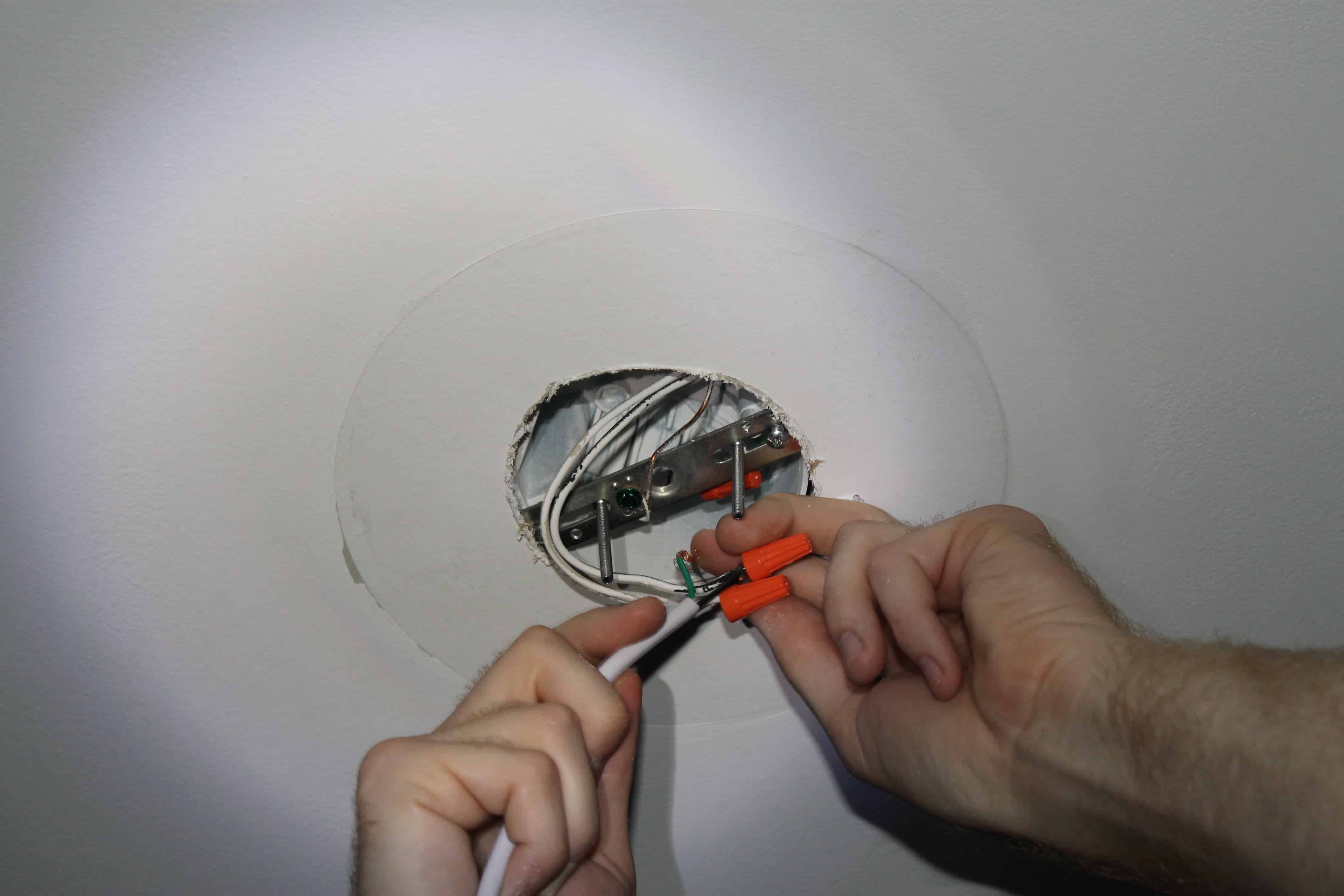 how to change a light fixture with power on