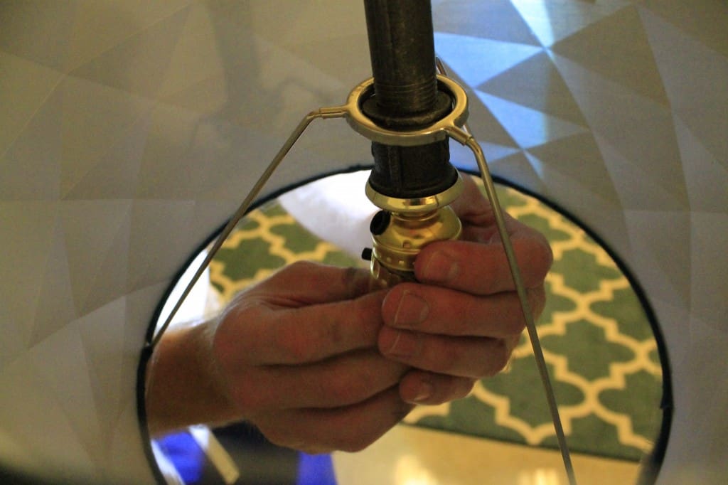 A photo of the lamp fitting being completed. 