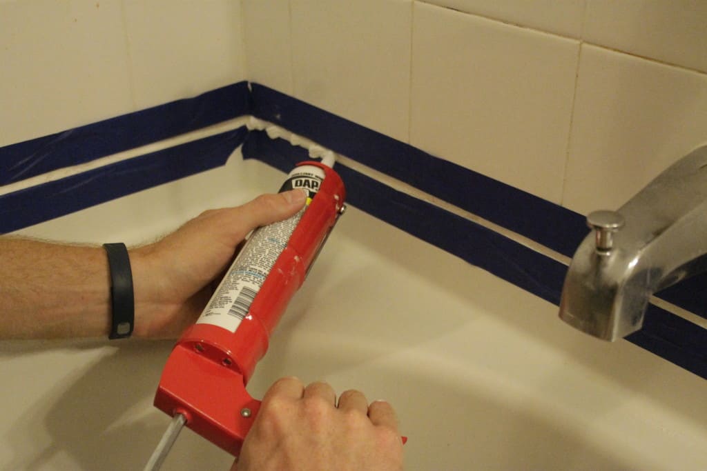 Refresh your Tub by Replacing the Caulk - Charleston Crafted