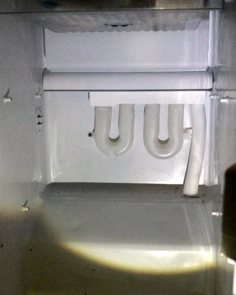 How To Replace A Refrigerator Water Reservoir - Charleston Crafted