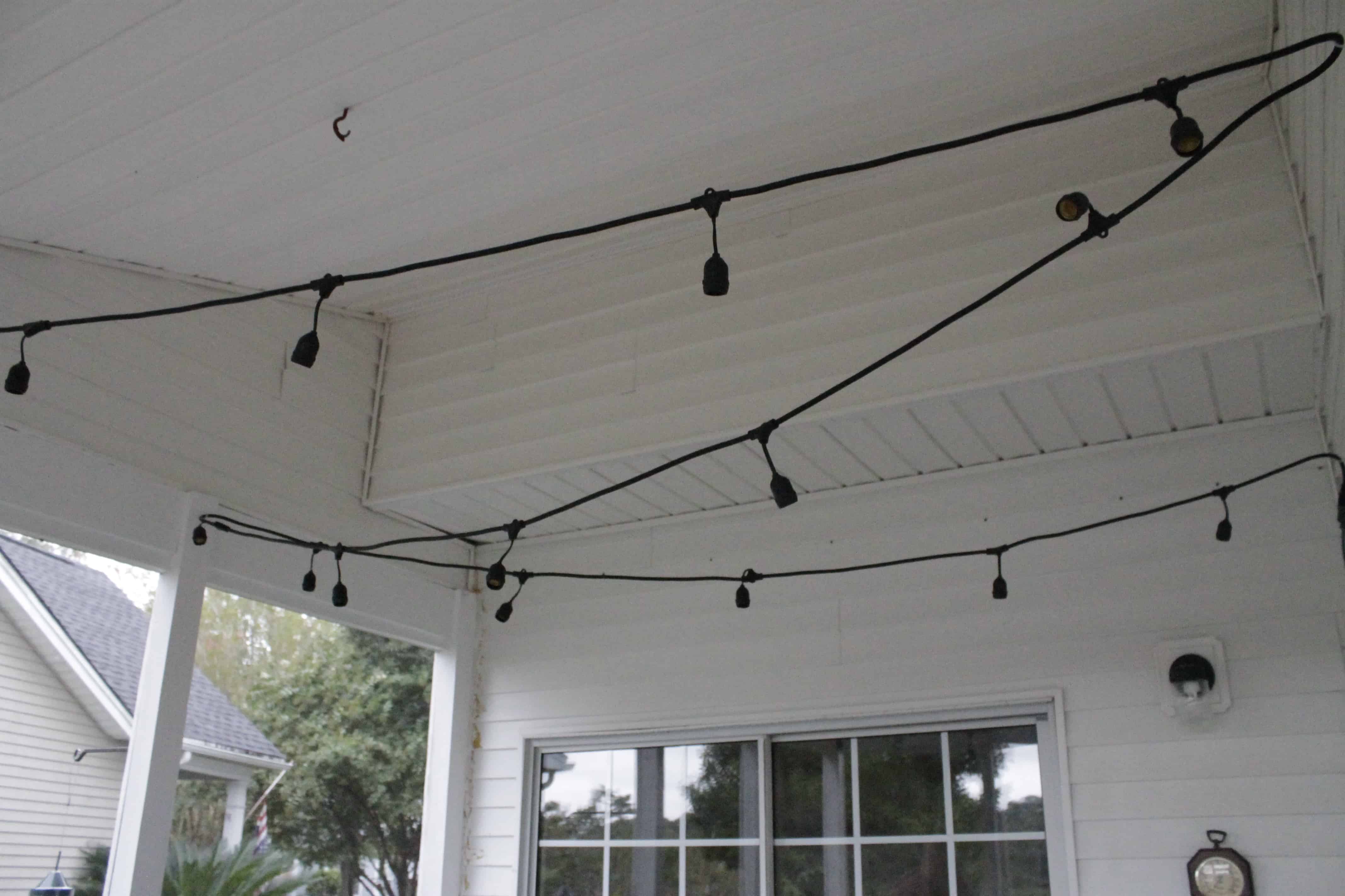 The Easiest Way to Hang String Lights on a Screened Porch