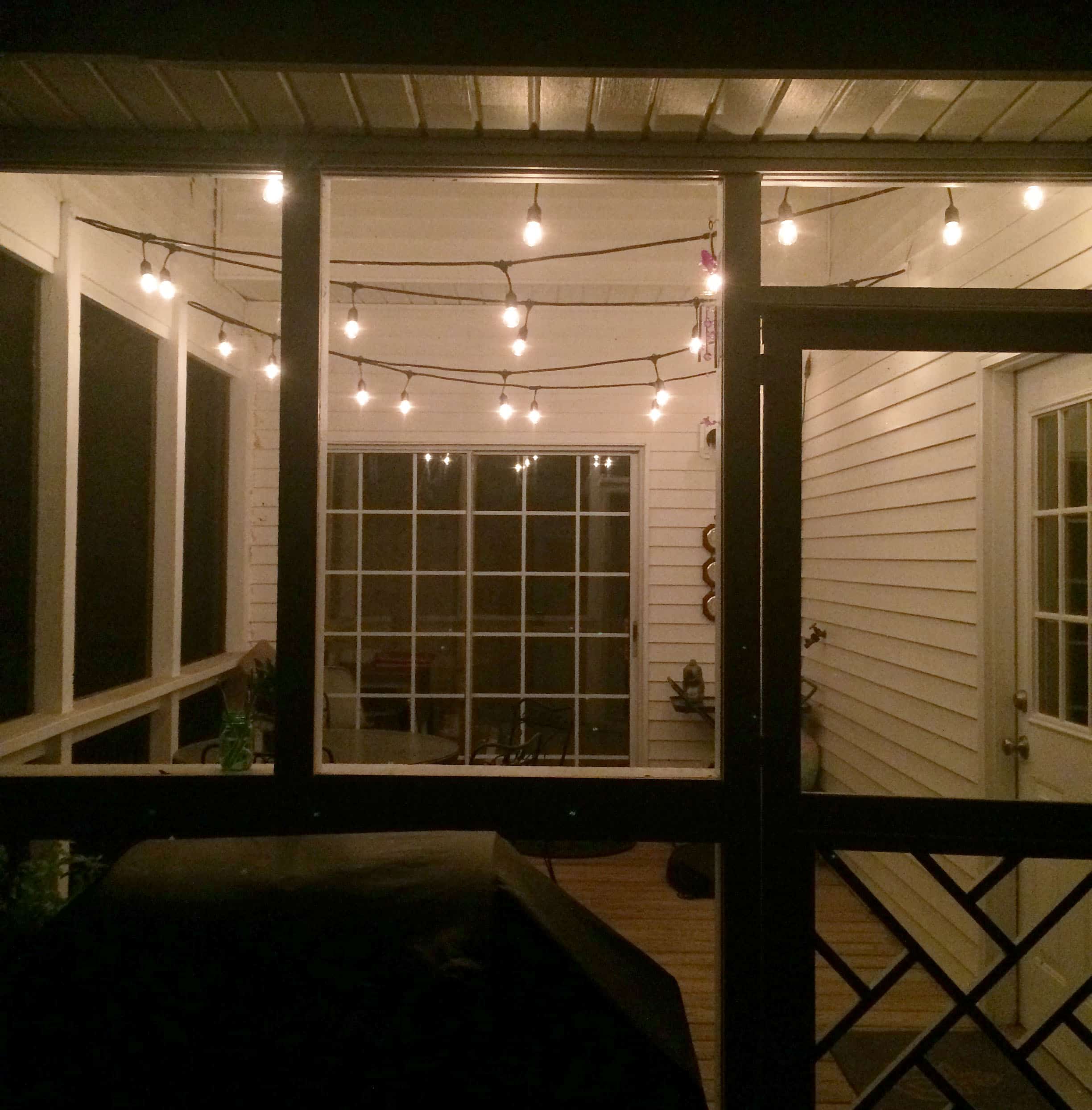 The Easiest Way To Hang String Lights On A Screened Porch