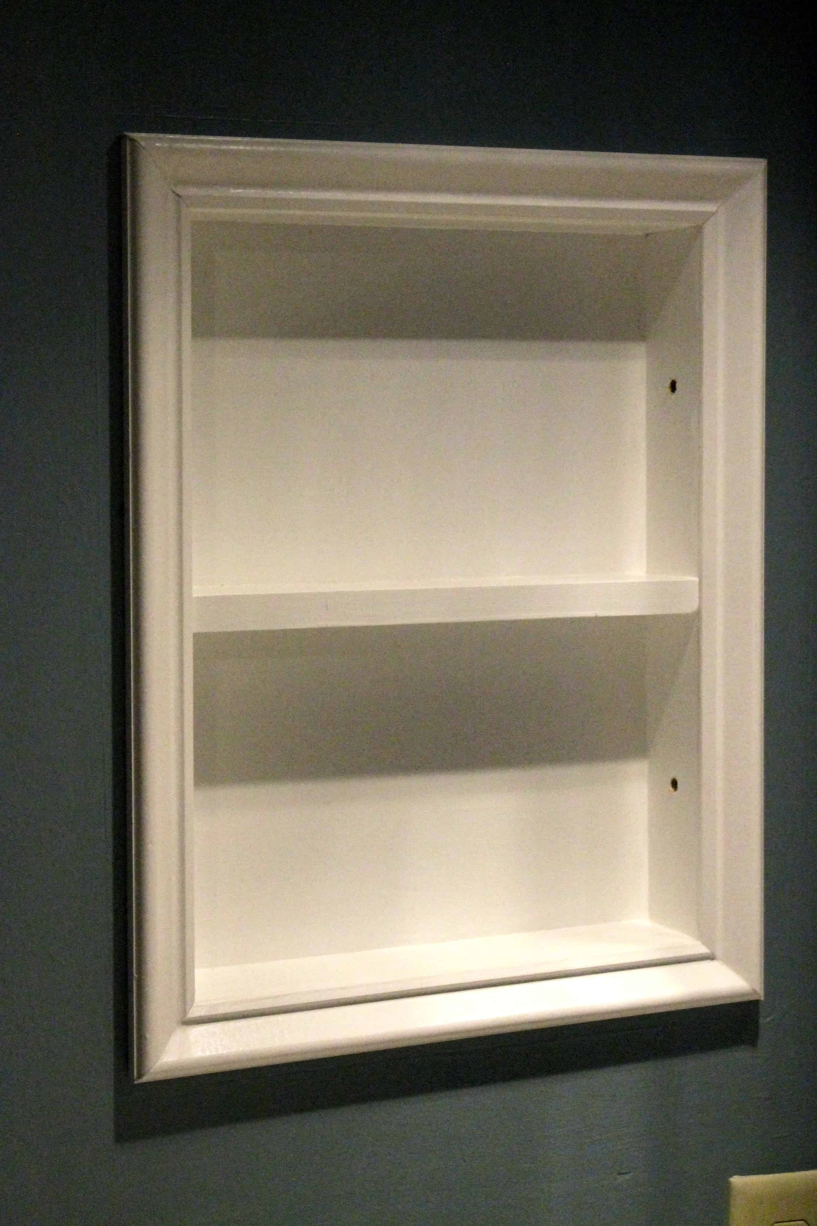 How to turn an old medicine cabinet into open shelving