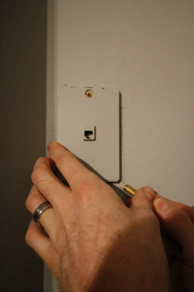Patching Drywall Over an Old Phone Jack - Charleston Crafted