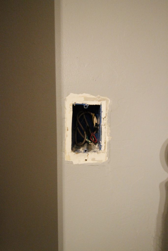 Patching Drywall Over an Old Phone Jack - Charleston Crafted