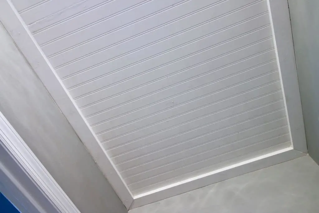 How to Cover Popcorn Ceilings with Beadboard ceiling - Charleston Crafted