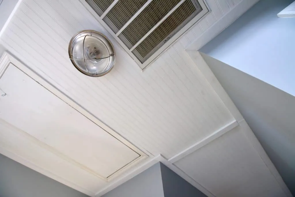 How to Cover Popcorn Ceilings with Beadboard ceiling- Charleston Crafted