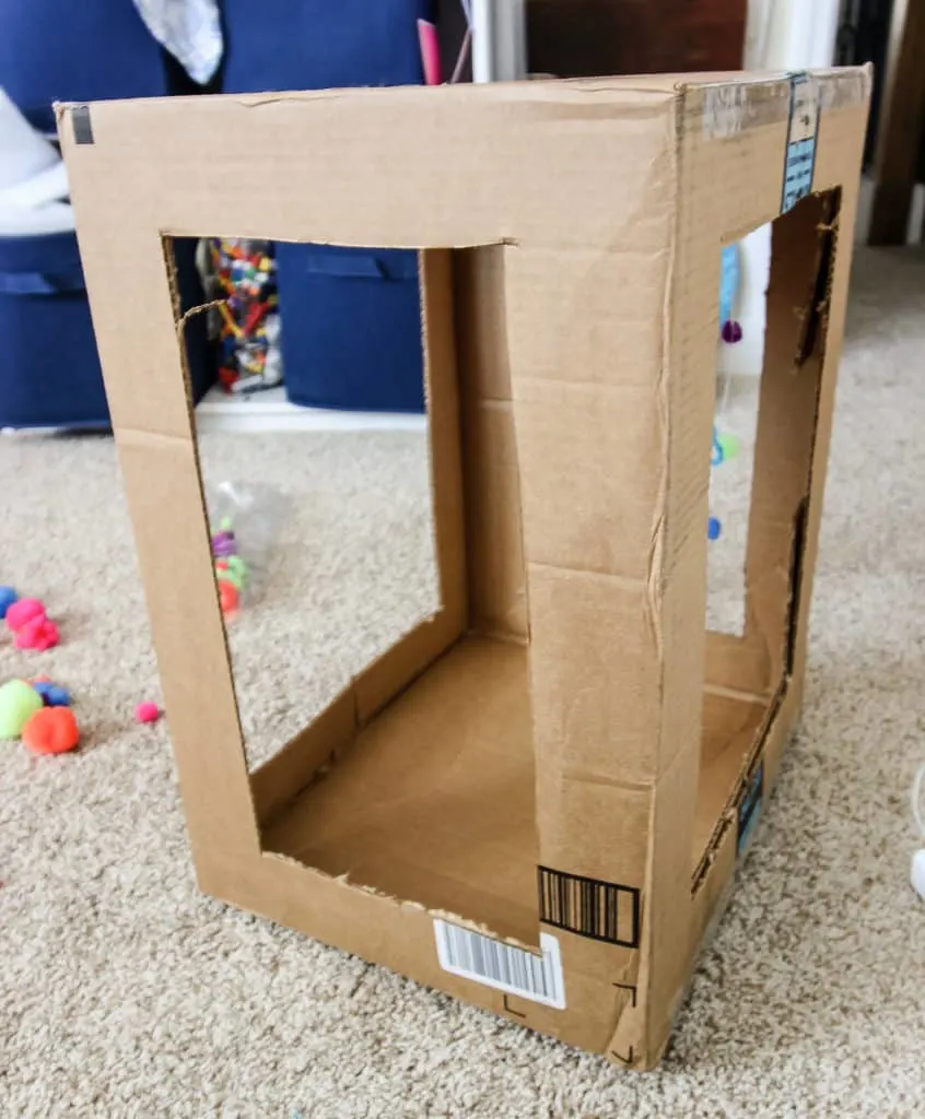 DIY Cardboard Cat Play Box via Charleston Crafted