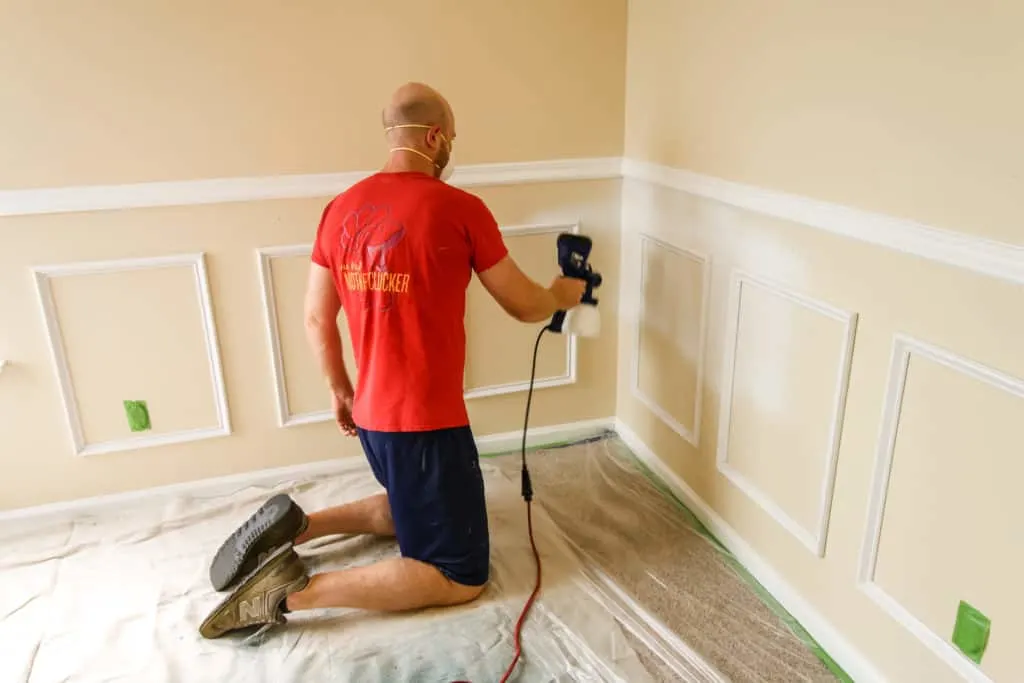 Paint spraying wainscoting