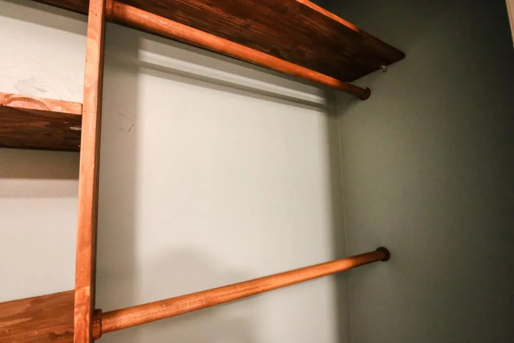 Nursery closet system with poles