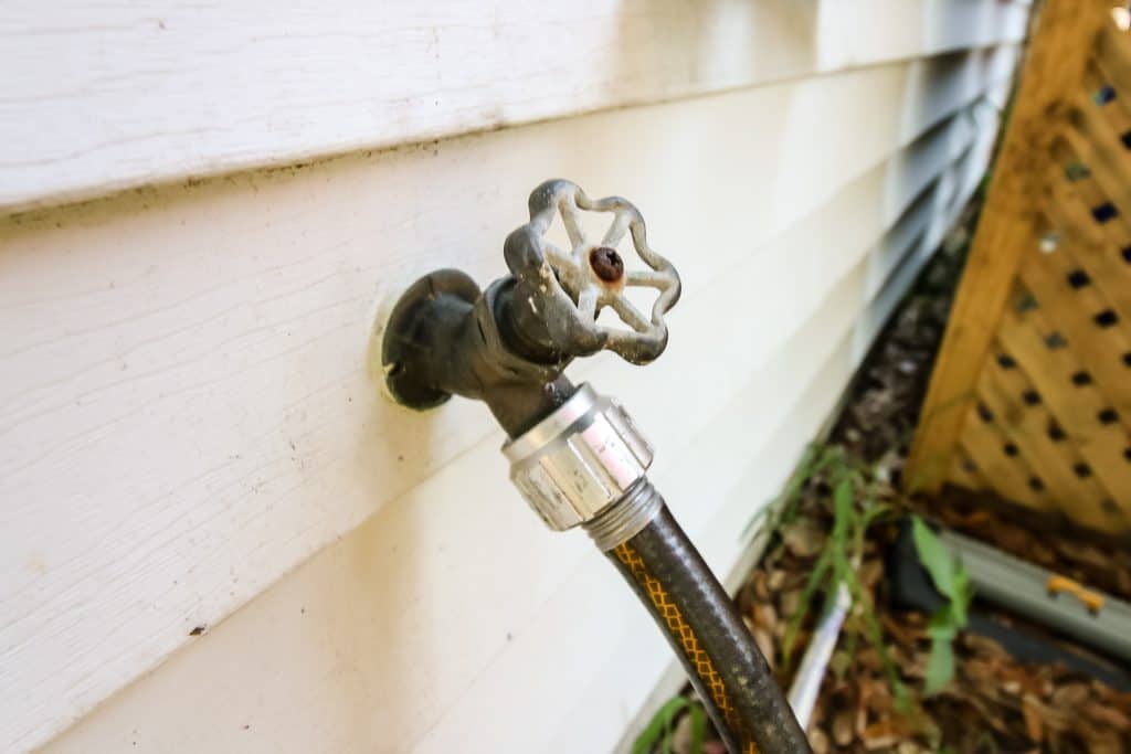 How to Remove a Stuck Hose on an Outdoor Spigot - Charleston Crafted