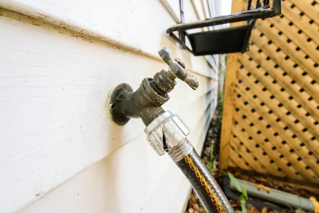 How to Remove a Stuck Hose on an Outdoor Spigot - Charleston Crafted