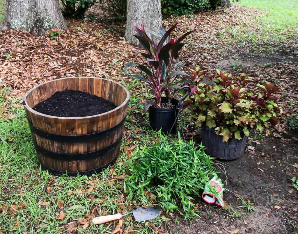 how to style a whiskey barrel planter