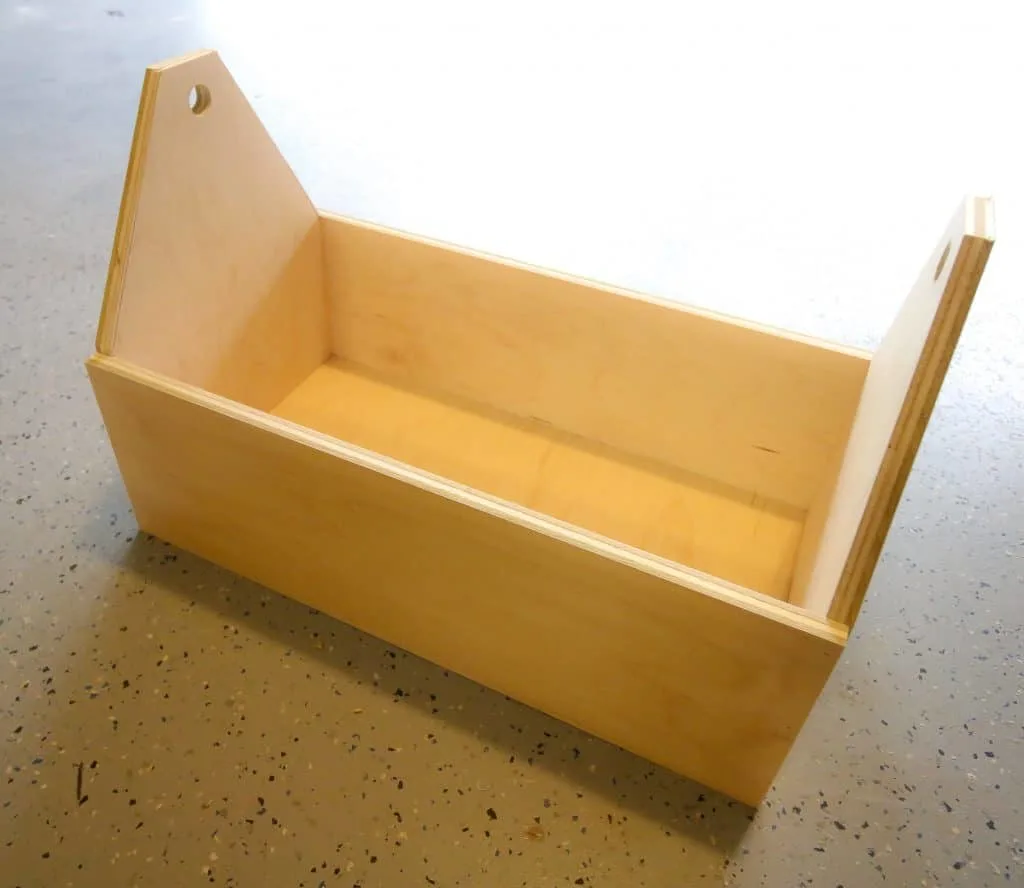 Attach side pieces to base of toolbox