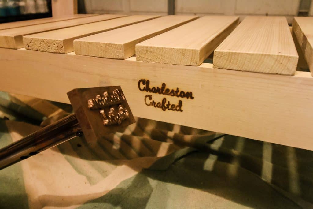 Gearheart Industry branding iron on console table