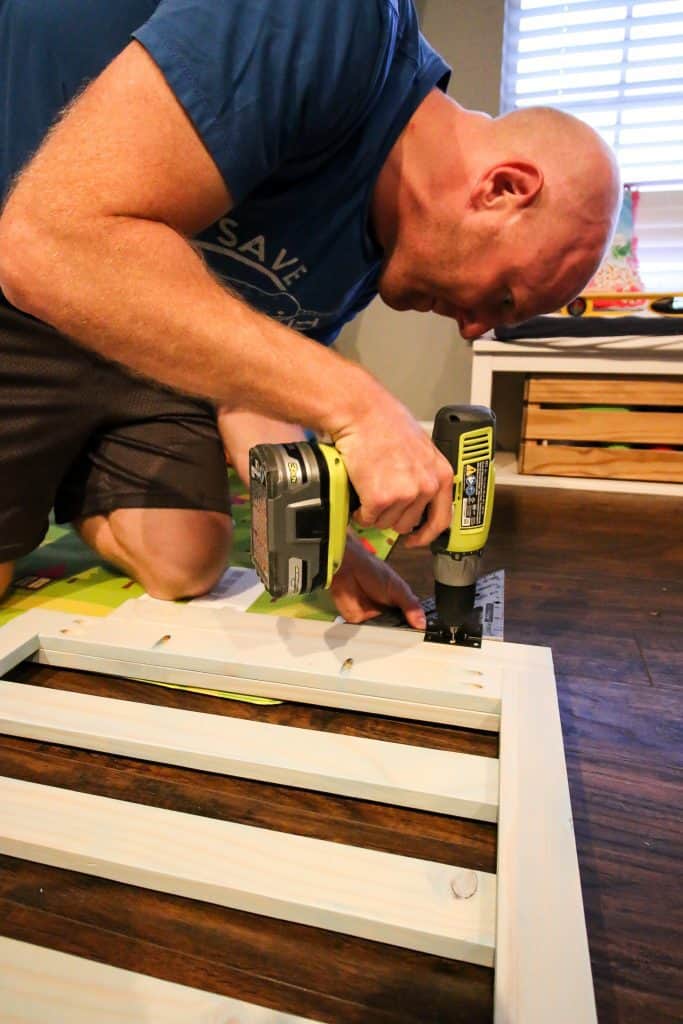 installing a wooden playpen