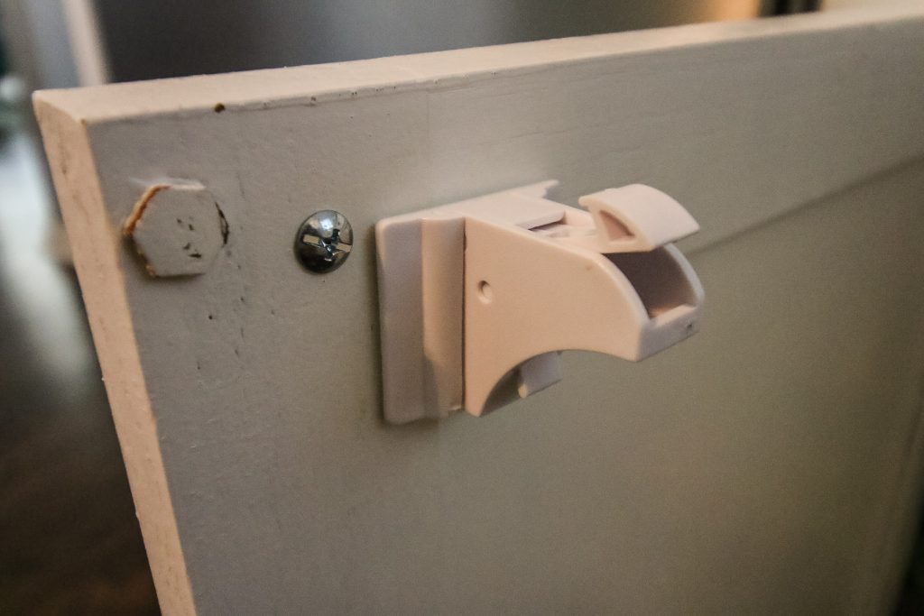 Latch installed to cabinet door