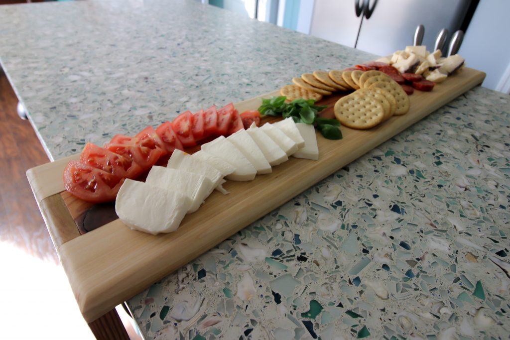 Overhead shot of cheese board with food