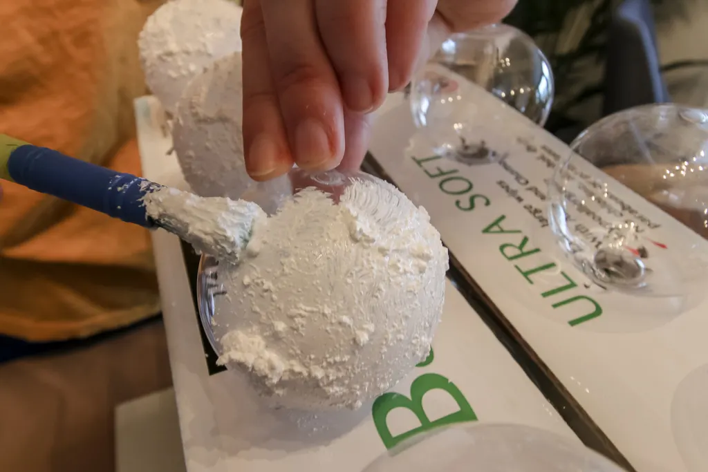 DIY Snowball Ornaments with snow tex paint