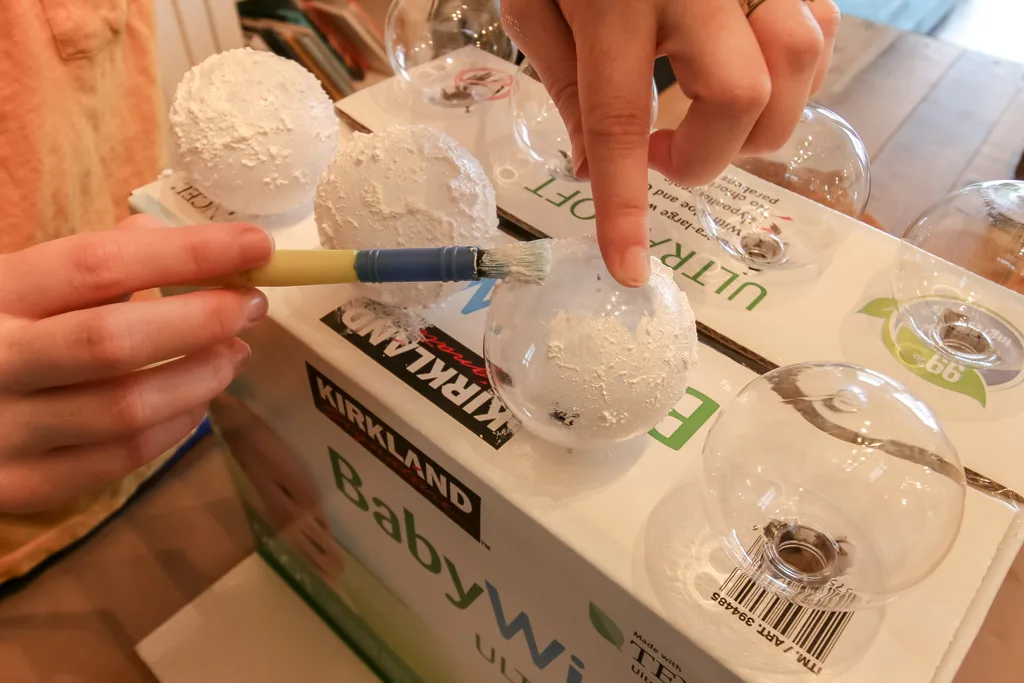 DIY Snowball Ornaments with snow tex paint