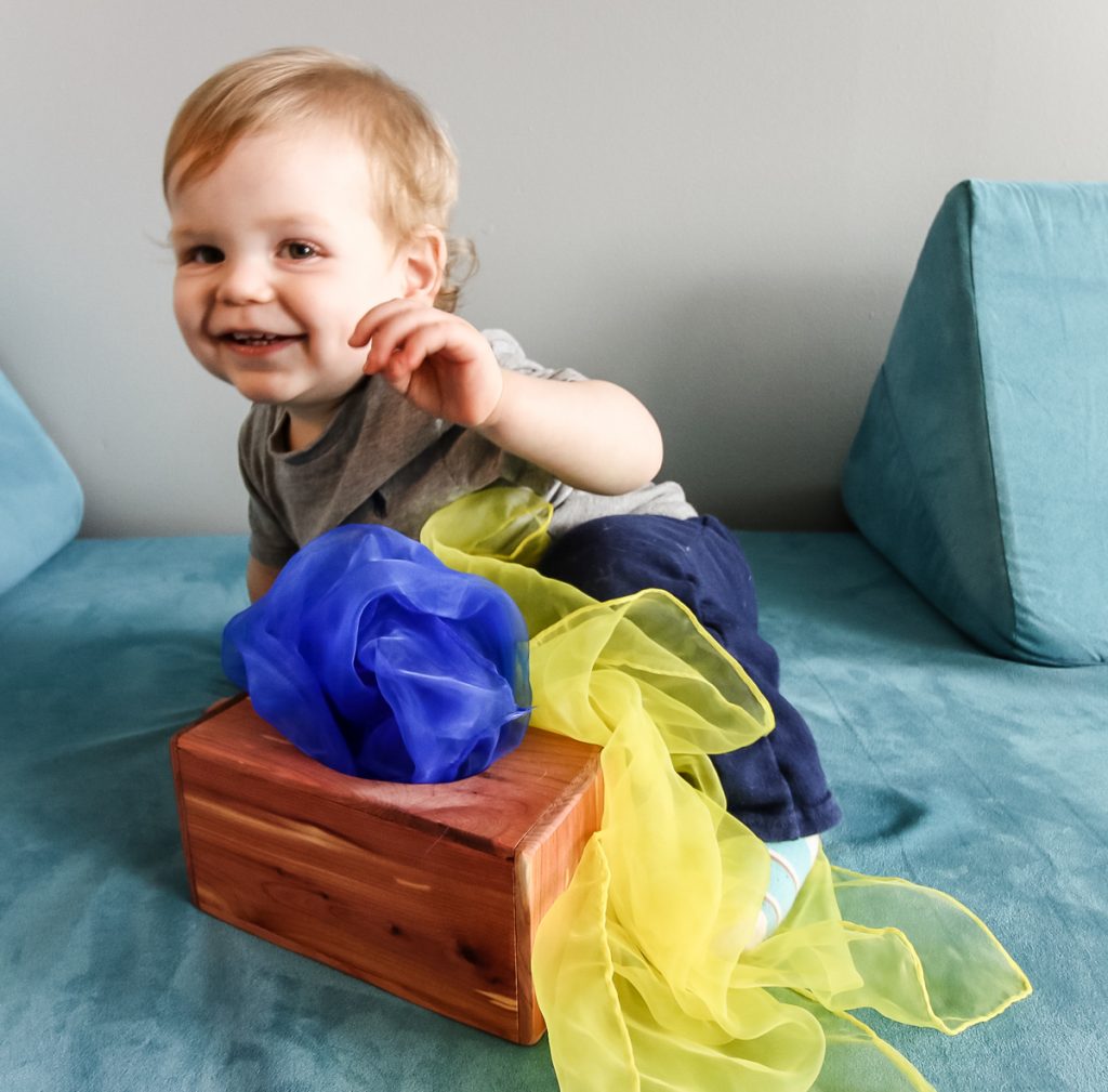 Pulling scarves from DIY magic tissue box