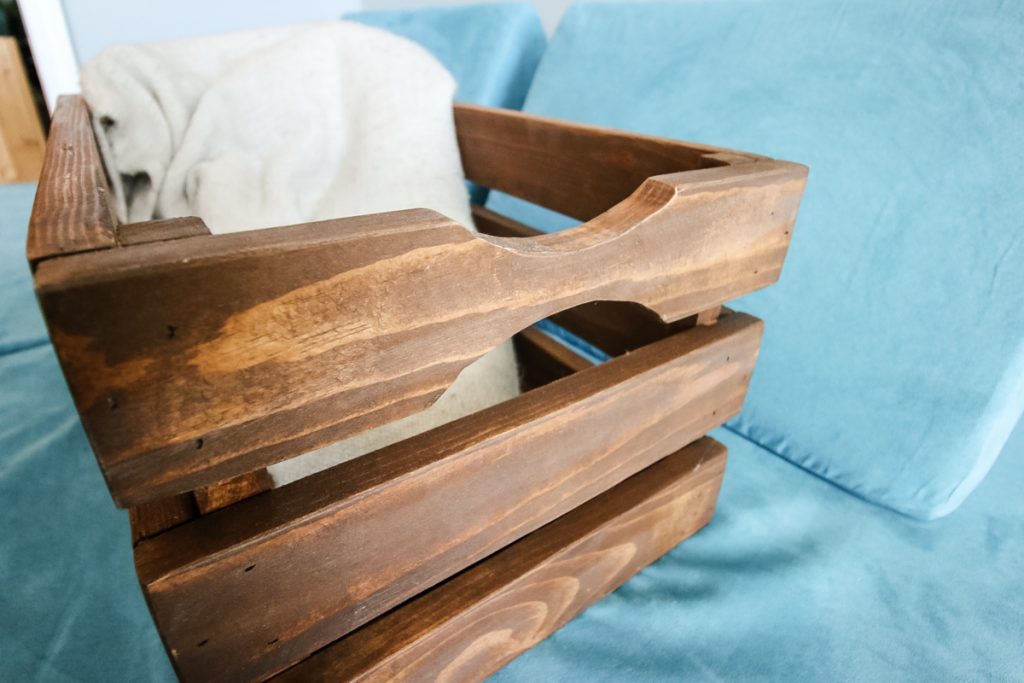 Wooden crate with blanket