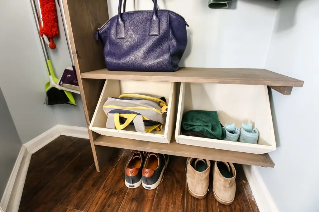 DIY wooden bins in bottom of closet