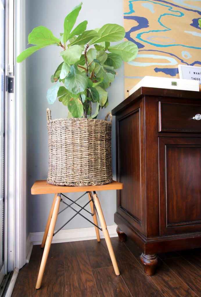 side table made from a cutting board and chair legs