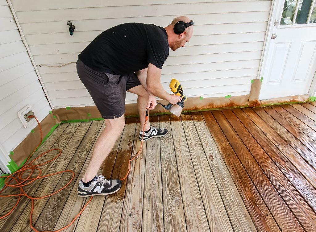 How to re-stain a deck with a sprayer