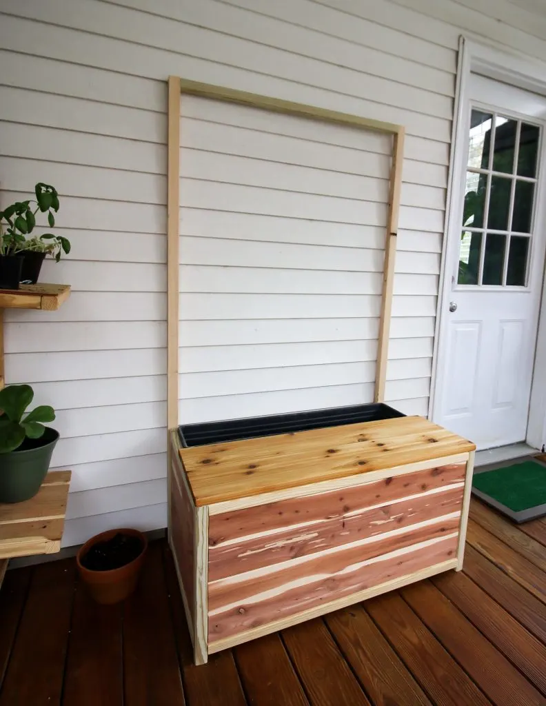 DIY planter bench with trellis and storage