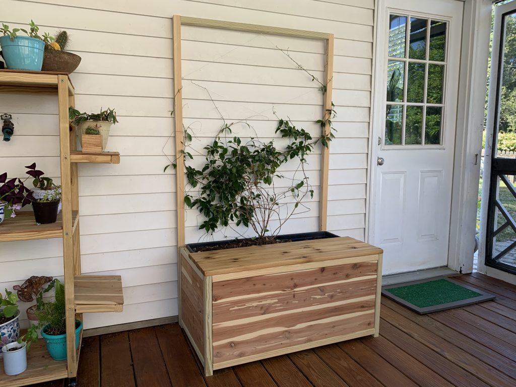 DIY planter bench with trellis and storage