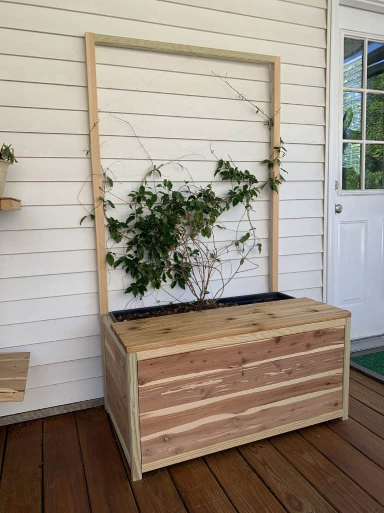 DIY planter bench with trellis and storage