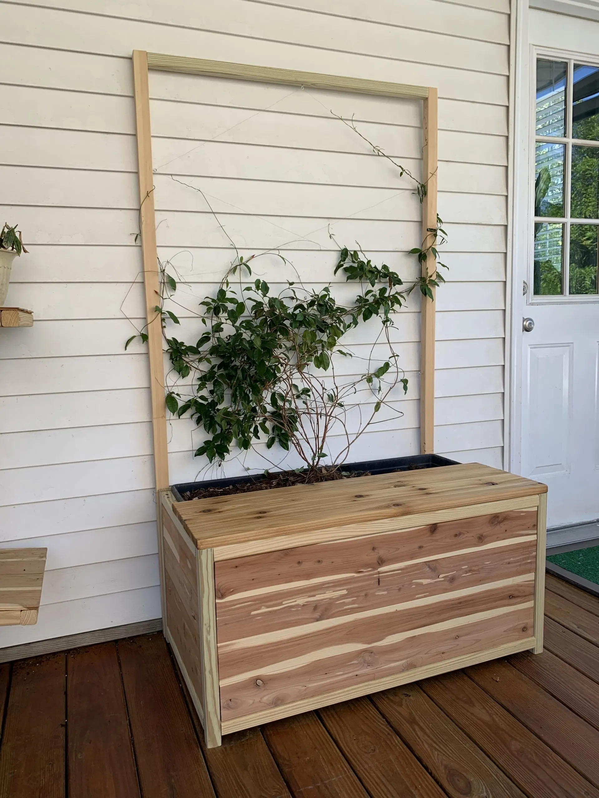 DIY planter bench with trellis and storage