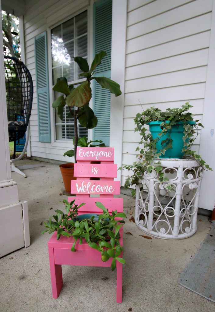 DIY chair planter with a stenciled design