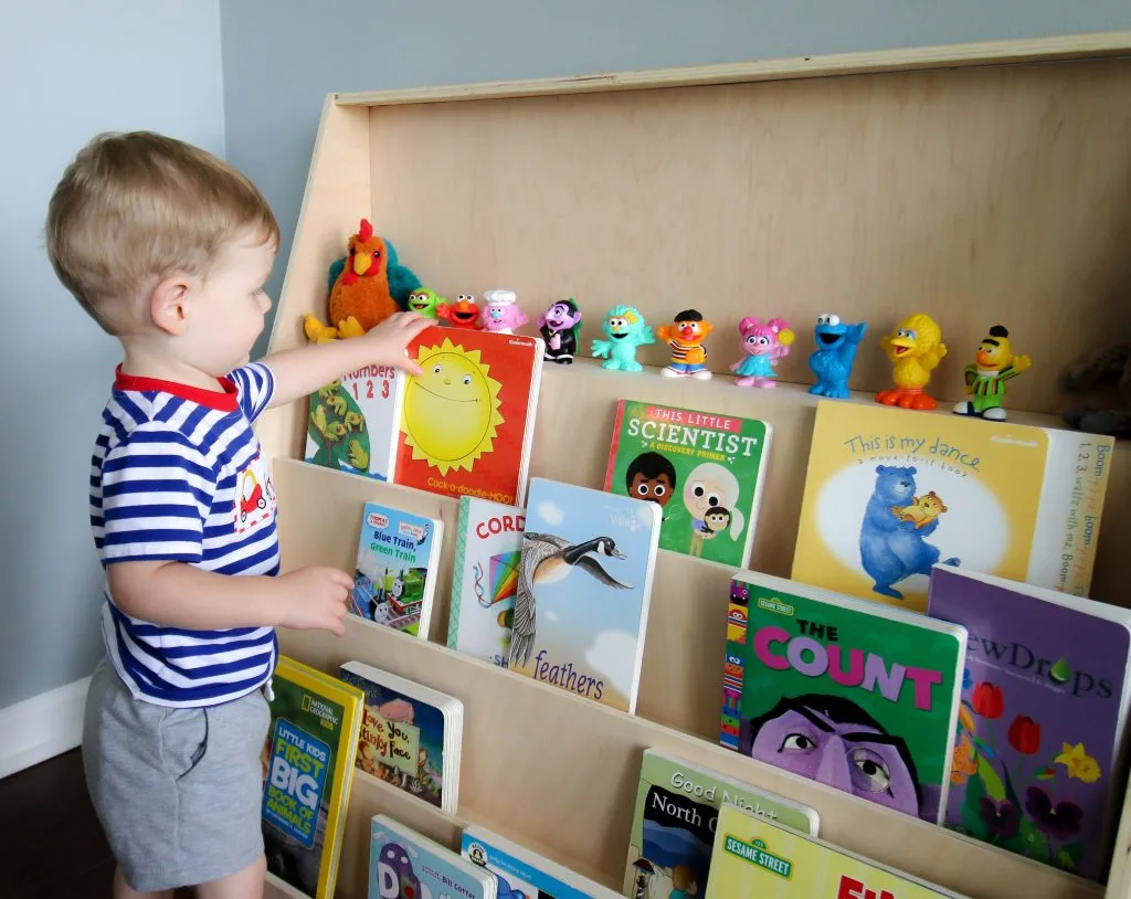 Toddler reaching for book