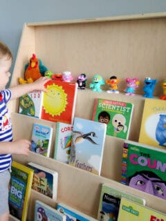 Toddler reaching for book