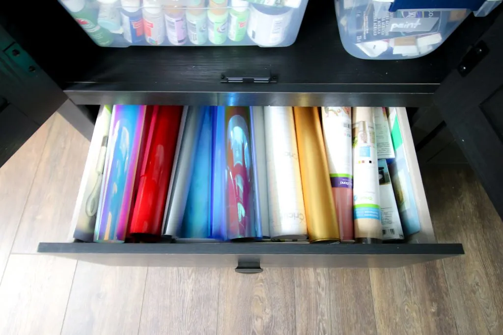 storing rolled vinyl in a cabinet drawer