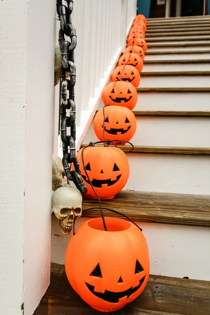 pumpkins up the stairs Our DIY Halloween Porch Decor