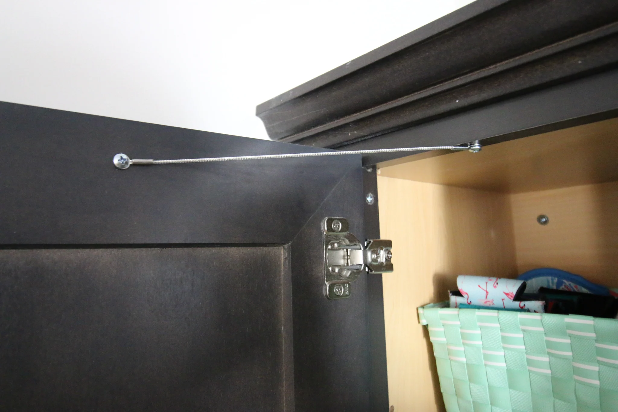 cabinet restraint in kitchen cabinet