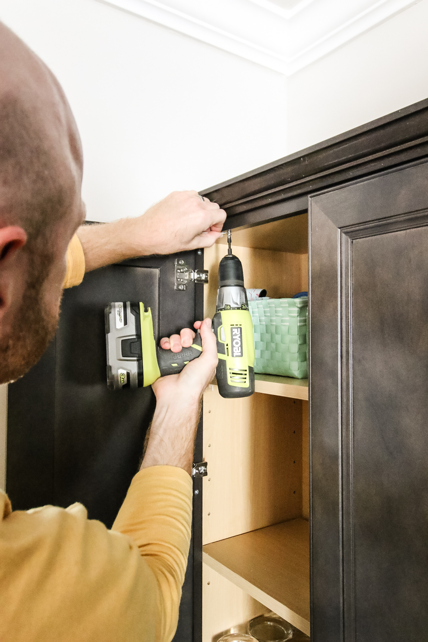 pre-drill hole in cabinet for cabinet restraint