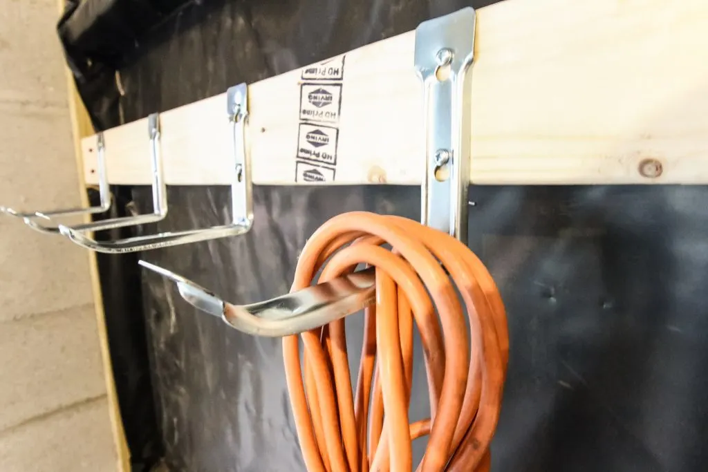 close up of extension cord storage hooks