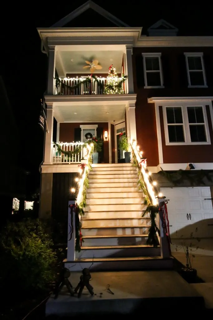 Christmas double porches with garland and red bows