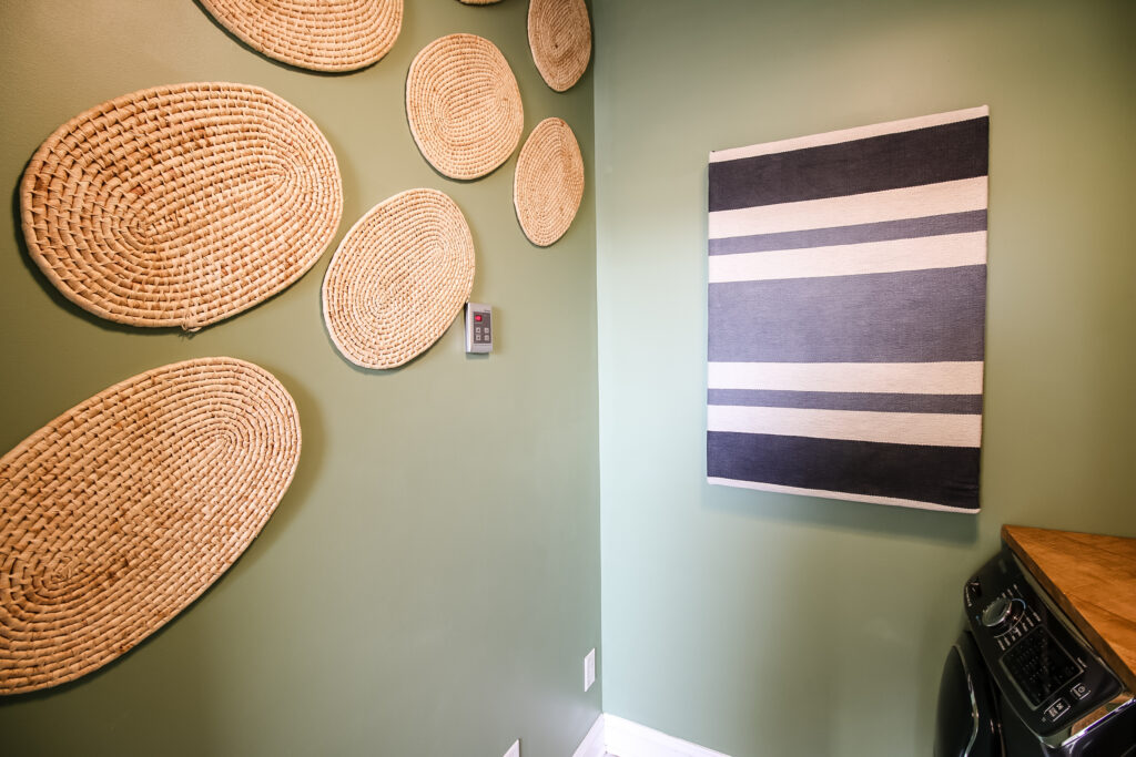Flat baskets on laundry room wall
