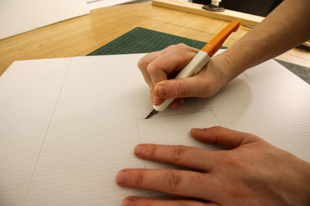 how to cut posterboard without bending it with an exacto knife