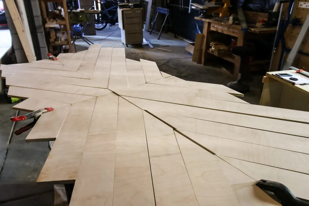 Angled pieces for geometric wood table top