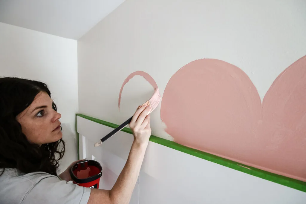 painting scallop trim on a wall