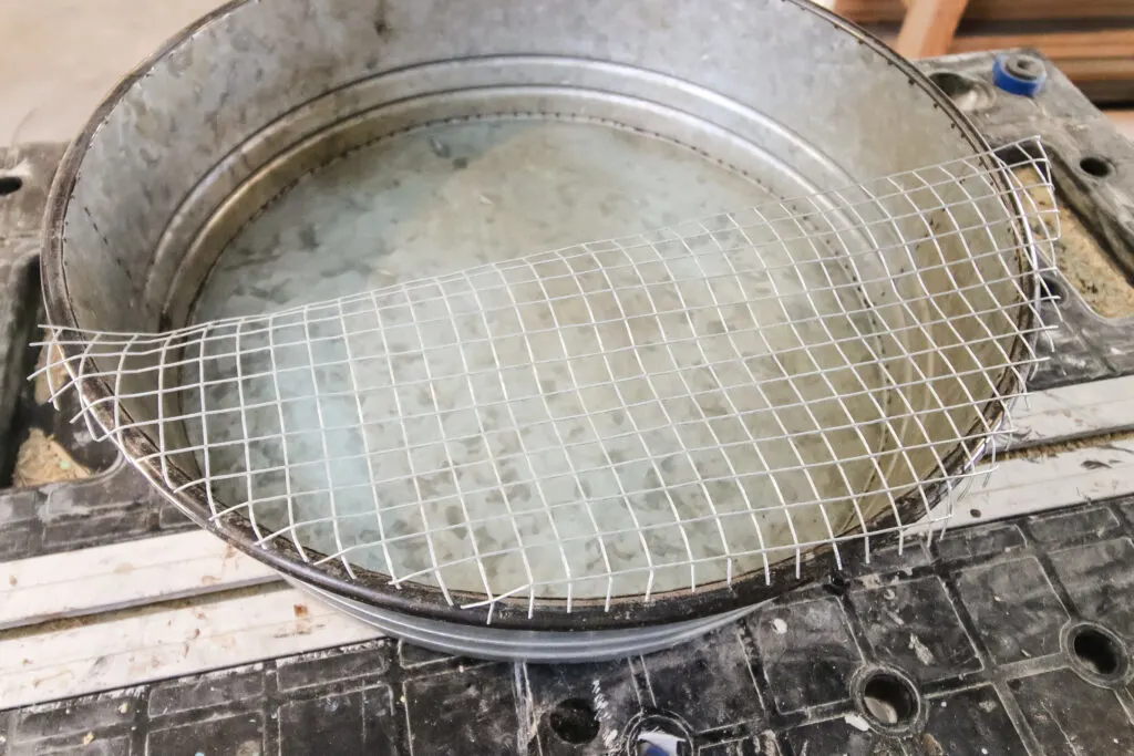 galvanized tray with metal mesh glued in place