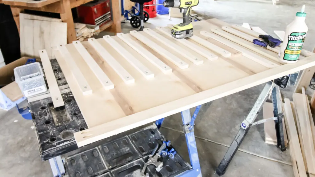 Attaching slats to rail